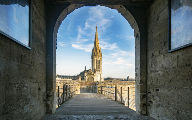 Church of San Pedro in Caen, framed by the main entrance of the Castle of Caen